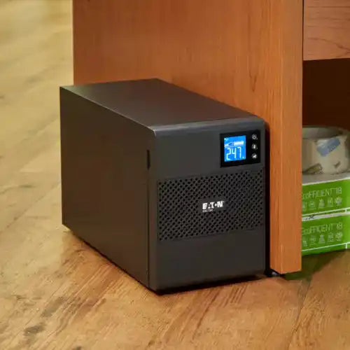 Eaton 5SC UPS, compact unit on wood surface